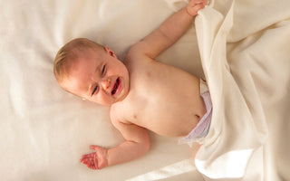 Baby græder i søvne